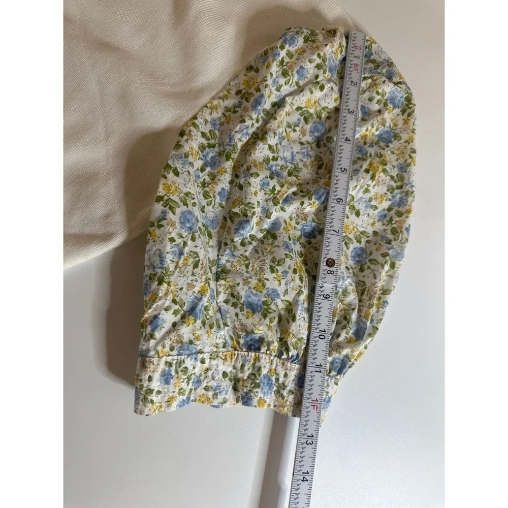 Anthropologie White Knit Top with Blue Floral Puff Sleeves